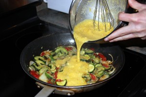pour egg mixture into pan